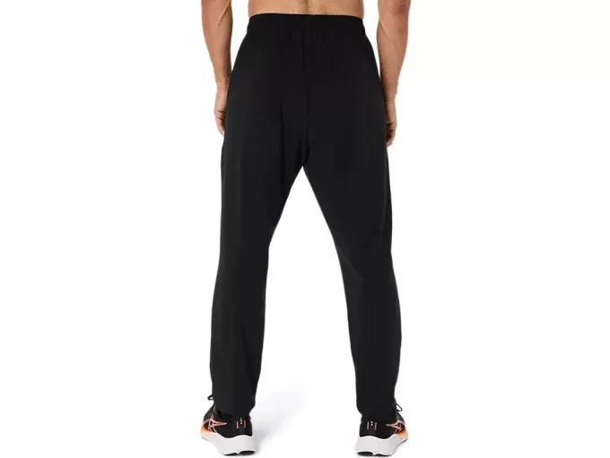 PANTALÓN TEJIDO CON BORDADO EN ESPIRAL DE ASICS PANTALÓN TEJIDO CON BORDADO EN ESPIRAL DE ASICS