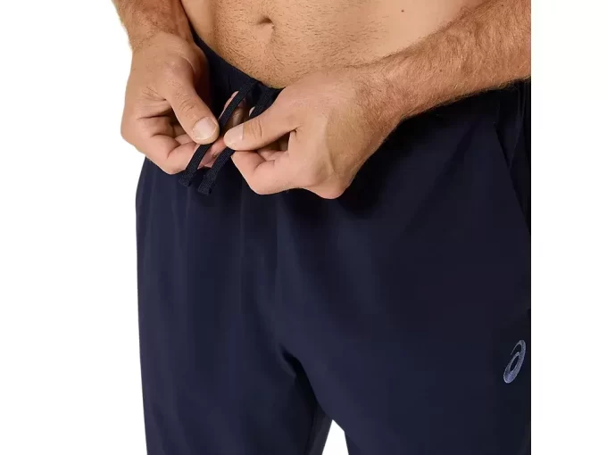 PANTALÓN TEJIDO CON BORDADO EN ESPIRAL DE ASICS PANTALÓN TEJIDO CON BORDADO EN ESPIRAL DE ASICS